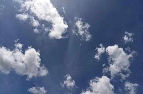 Blue sky background with tiny clouds Stock Photos