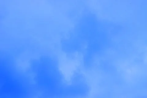 Blue sky background with tiny clouds Stock Photos