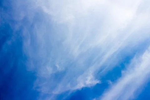 Blue sky background with tiny clouds Stock Photos