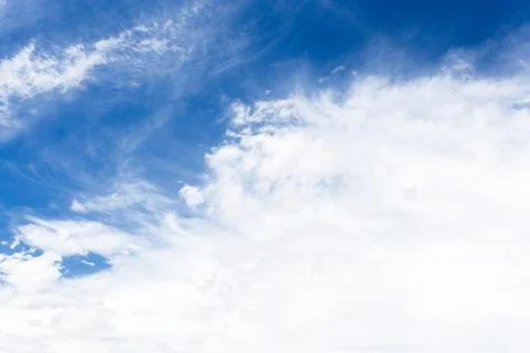 Blue sky background with tiny clouds Stock Photos
