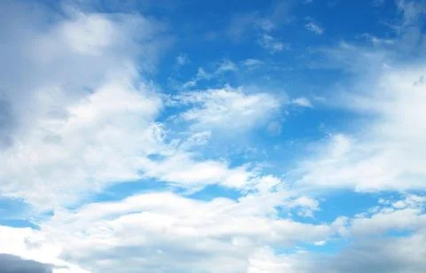 Blue sky background with tiny clouds. 스톡 사진