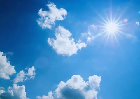 Blue sky background with tiny clouds, sun and bright blue sky. 스톡 사진