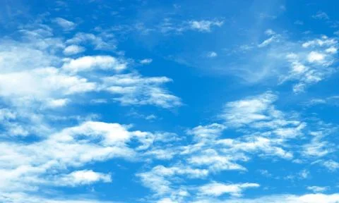 Blue sky background with tiny clouds. 스톡 사진