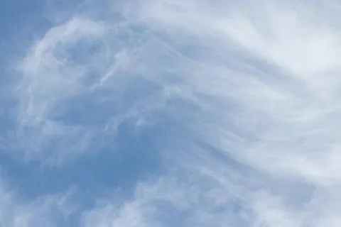 Blue sky background with tiny clouds. Foto stock