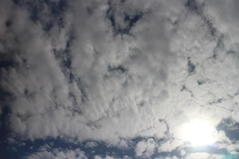Blue sky background with tiny clouds Foto stock