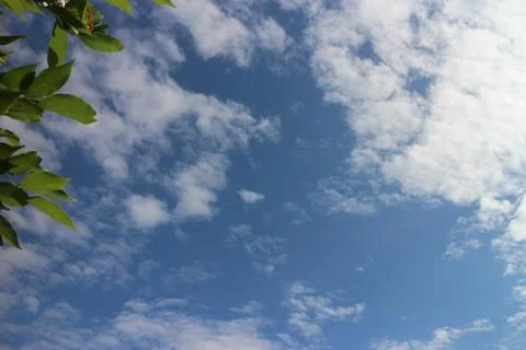 Blue sky background with tiny clouds Stock Photos