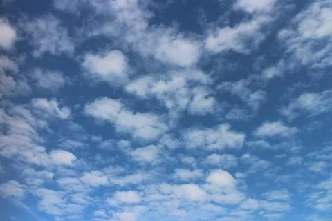 Blue sky background with tiny clouds 스톡 사진