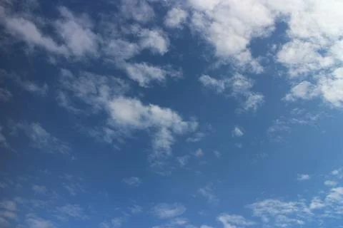 Blue sky background with tiny clouds Stock Photos