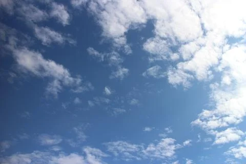 Blue sky background with tiny clouds Stock Photos