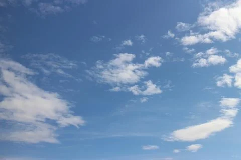 Blue sky background with tiny clouds	 写真素材