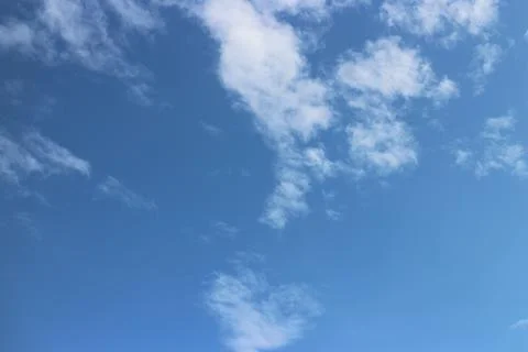 Blue sky background with tiny clouds 스톡 사진