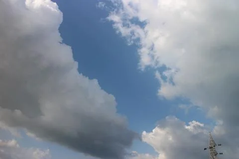 Blue sky background with tiny clouds Foto stock