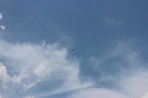 Blue sky background with tiny clouds Stock Photos