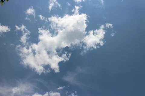 Blue sky background with tiny clouds Foto stock