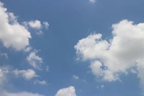 Blue sky background with tiny clouds Stock Photos