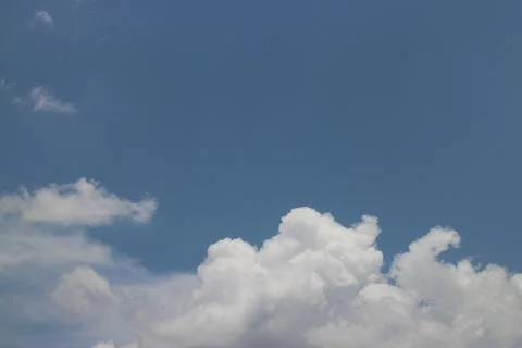 Blue sky background with tiny clouds Stock Photos