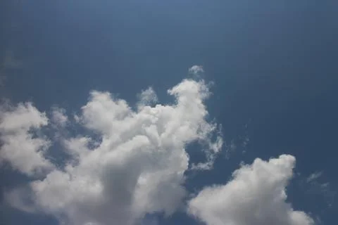 Blue sky background with tiny clouds Stock Photos