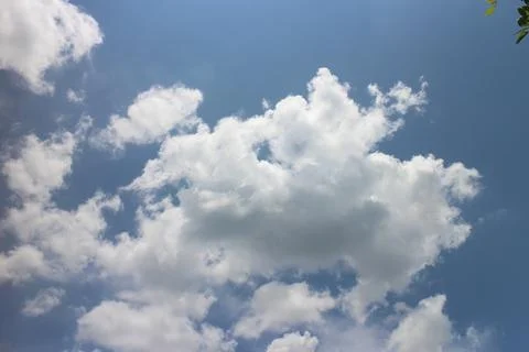 Blue sky background with tiny clouds Stock Photos