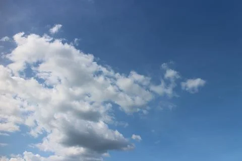 Blue sky background with tiny clouds Stock Photos