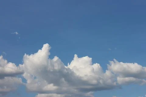 Blue sky background with tiny clouds Foto stock