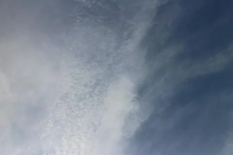 Blue sky background with tiny clouds 写真素材