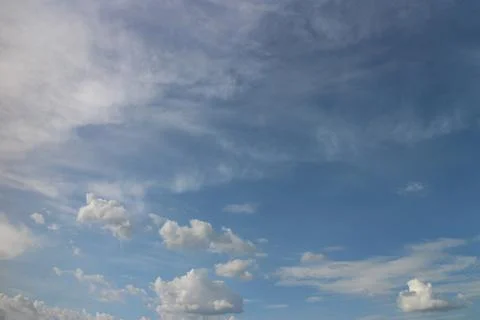 Blue sky background with tiny clouds Foto stock
