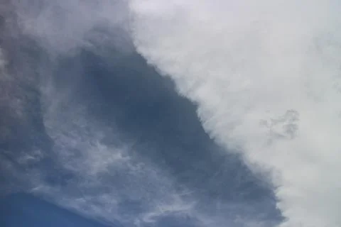 Blue sky background with tiny clouds Foto stock