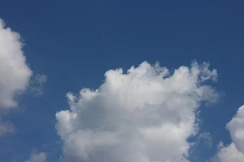 Blue sky background with tiny clouds Stock Photos