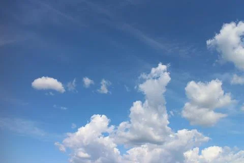 Blue sky background with tiny clouds Stock Photos