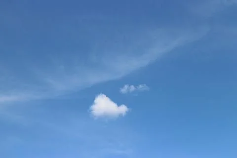 Blue sky background with tiny clouds Stock Photos