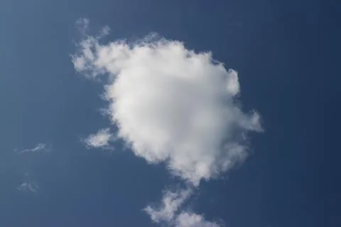 Blue sky background with tiny clouds 写真素材