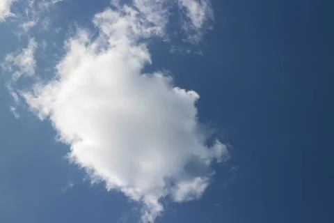 Blue sky background with tiny clouds Foto stock