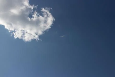 Blue sky background with tiny clouds Stock Photos