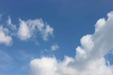 Blue sky background with tiny clouds Stock Photos