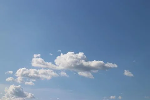 Blue sky background with tiny clouds 写真素材