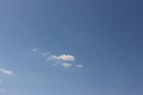 Blue sky background with tiny clouds Stock Photos