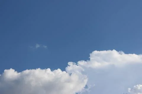Blue sky background with tiny clouds Stock Photos