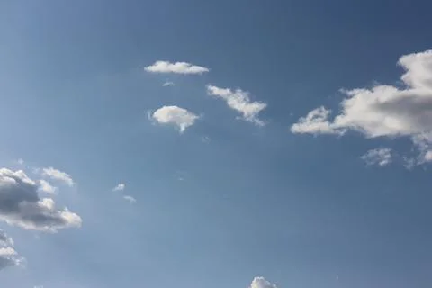 Blue sky background with tiny clouds Foto stock