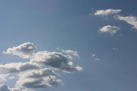 Blue sky background with tiny clouds Foto stock