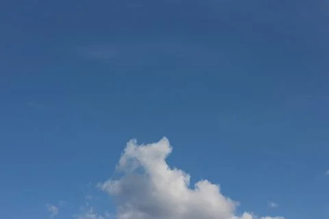 Blue sky background with tiny clouds Stock Photos