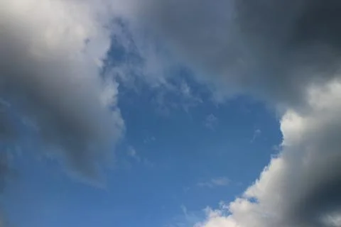 Blue sky background with tiny clouds Stock Photos