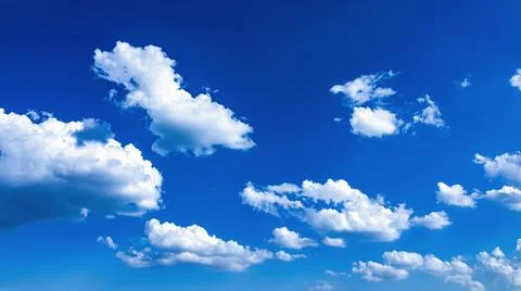 Blue sky background with tiny clouds. Nature composition. Sky background Stock Photos