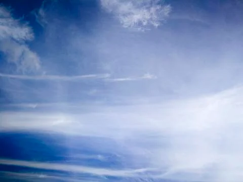 Blue sky background with white cloud. Stock Photos