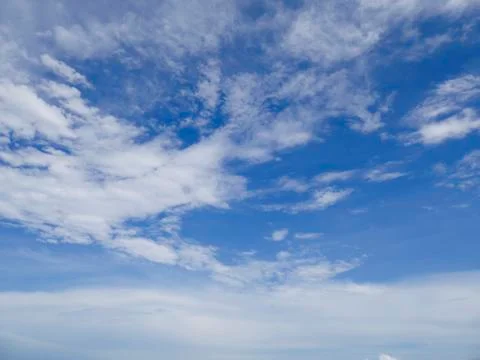 Blue sky background with white cloud. Stock Photos
