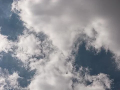 Blue sky background with white cloud providing copy space Stock Photos