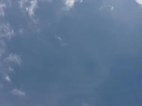 Blue sky background with white cloud providing copy space Stock Photos
