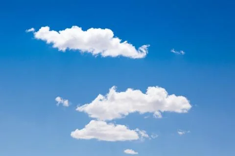 Blue sky background with white clouds Stock Photos