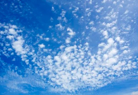 Blue sky background with white clouds Stock Photos