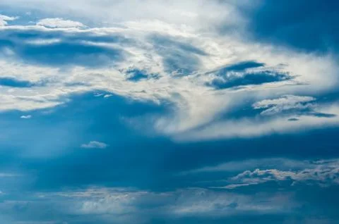 Blue sky background with white clouds Stock Photos