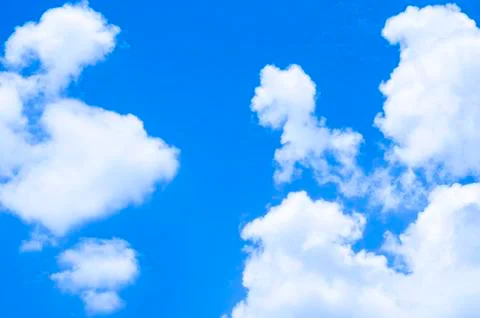 Blue sky background with white clouds Stock Photos
